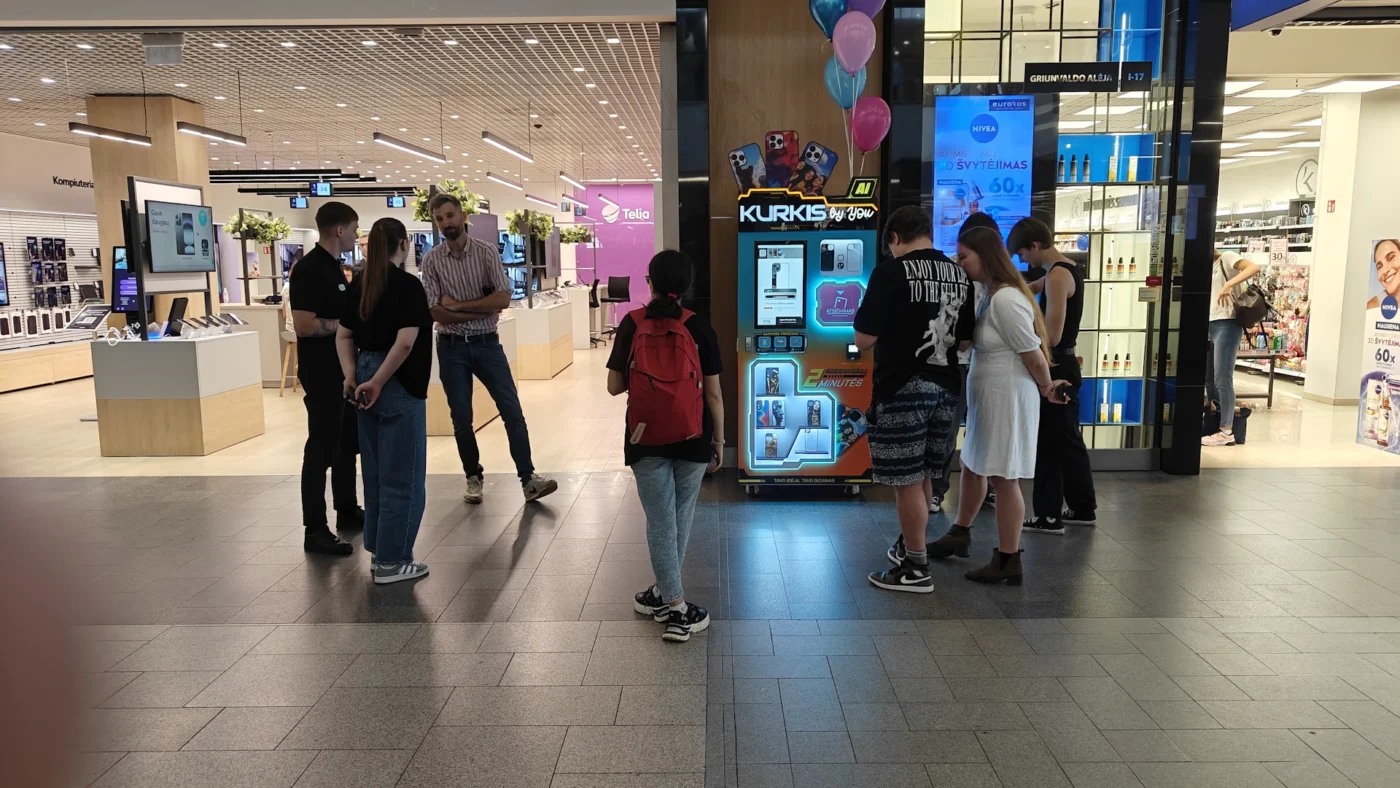 Modern, high-tech instant phone case customization station, illustrating the design-online and print-local process for express fulfillment.