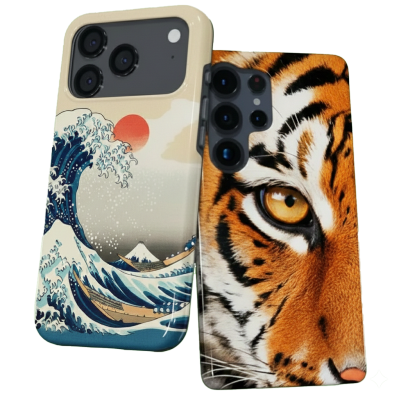 Two smartphones side-by-side showcasing custom cases; one features Hokusai's "The Great Wave off Kanagawa" and the other features a close-up, high-detail portrait of a tiger's face.