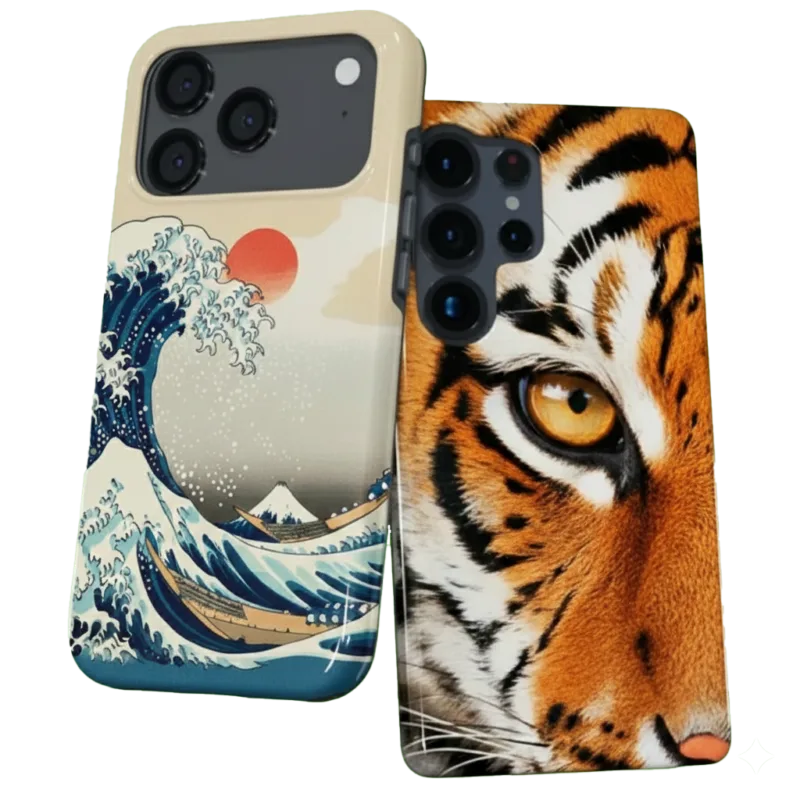 Two smartphones side-by-side showcasing custom cases; one features Hokusai's "The Great Wave off Kanagawa" and the other features a close-up, high-detail portrait of a tiger's face.